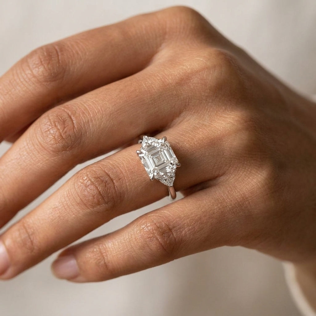 Meiara AI Lifestyle — Eve Asscher Claw Prong Three-Stone Ring
