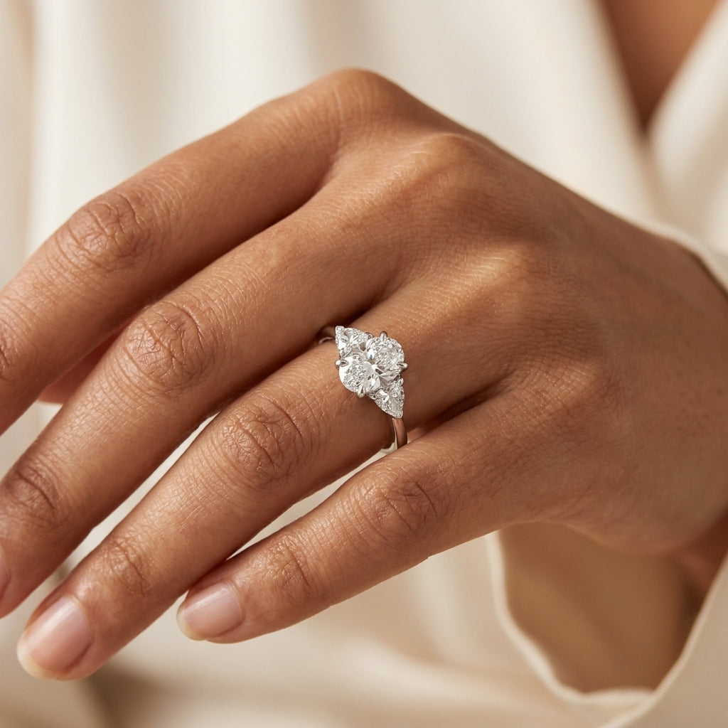 Meiara AI Lifestyle — Eve Oval Claw Prong Three-Stone Ring