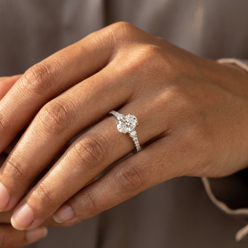 Meiara AI Lifestyle — Eve Oval Graduated Side-Stone Engagement Ring