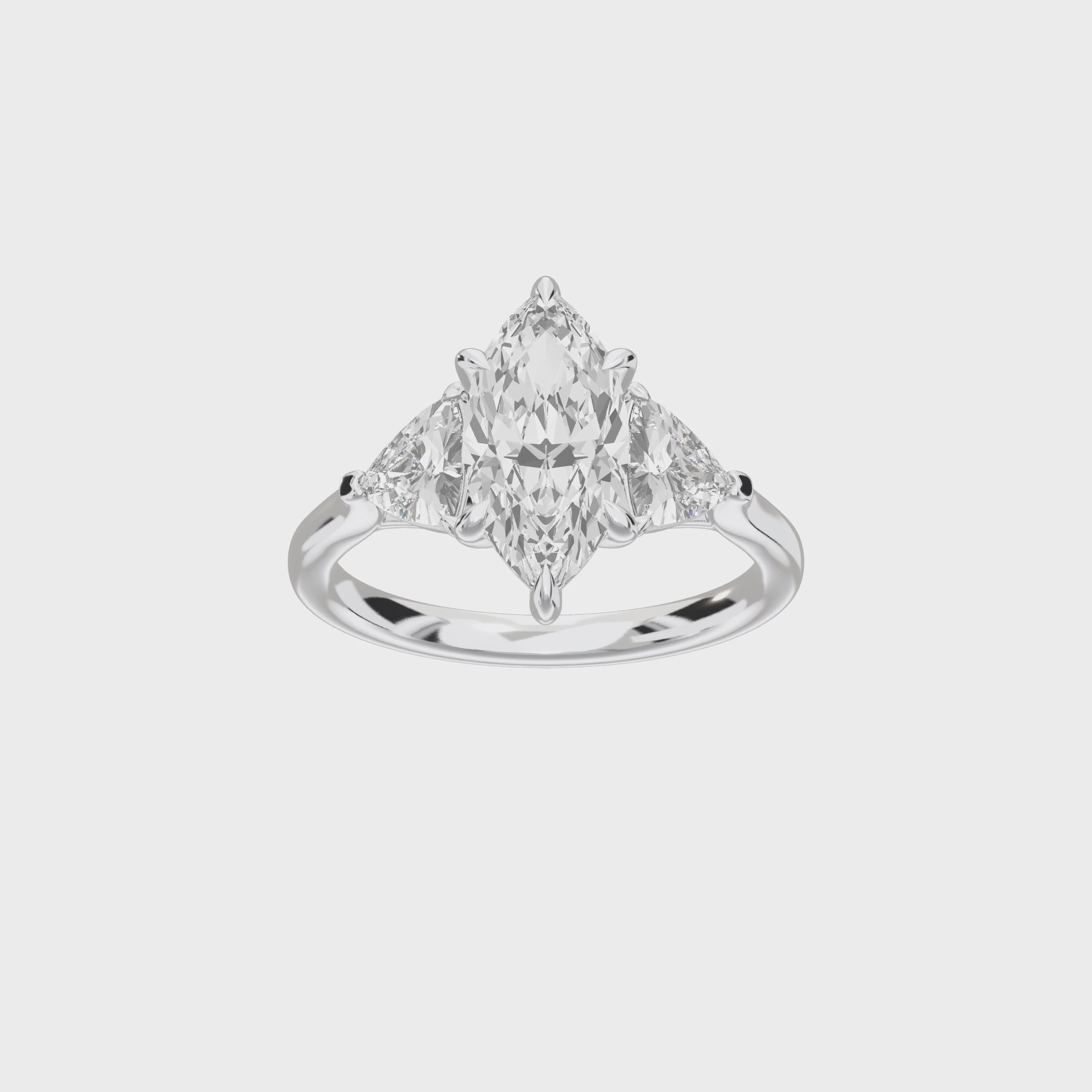 Eve Marquise Claw Prong Three-Stone Ring — 360 view