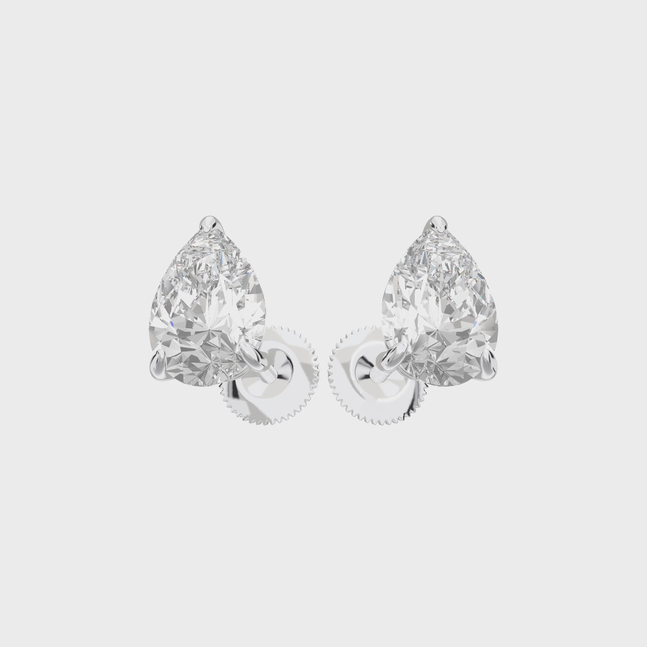 Eve Pear Radiant Three-Prong Martini Stud — 360 view 2 ct