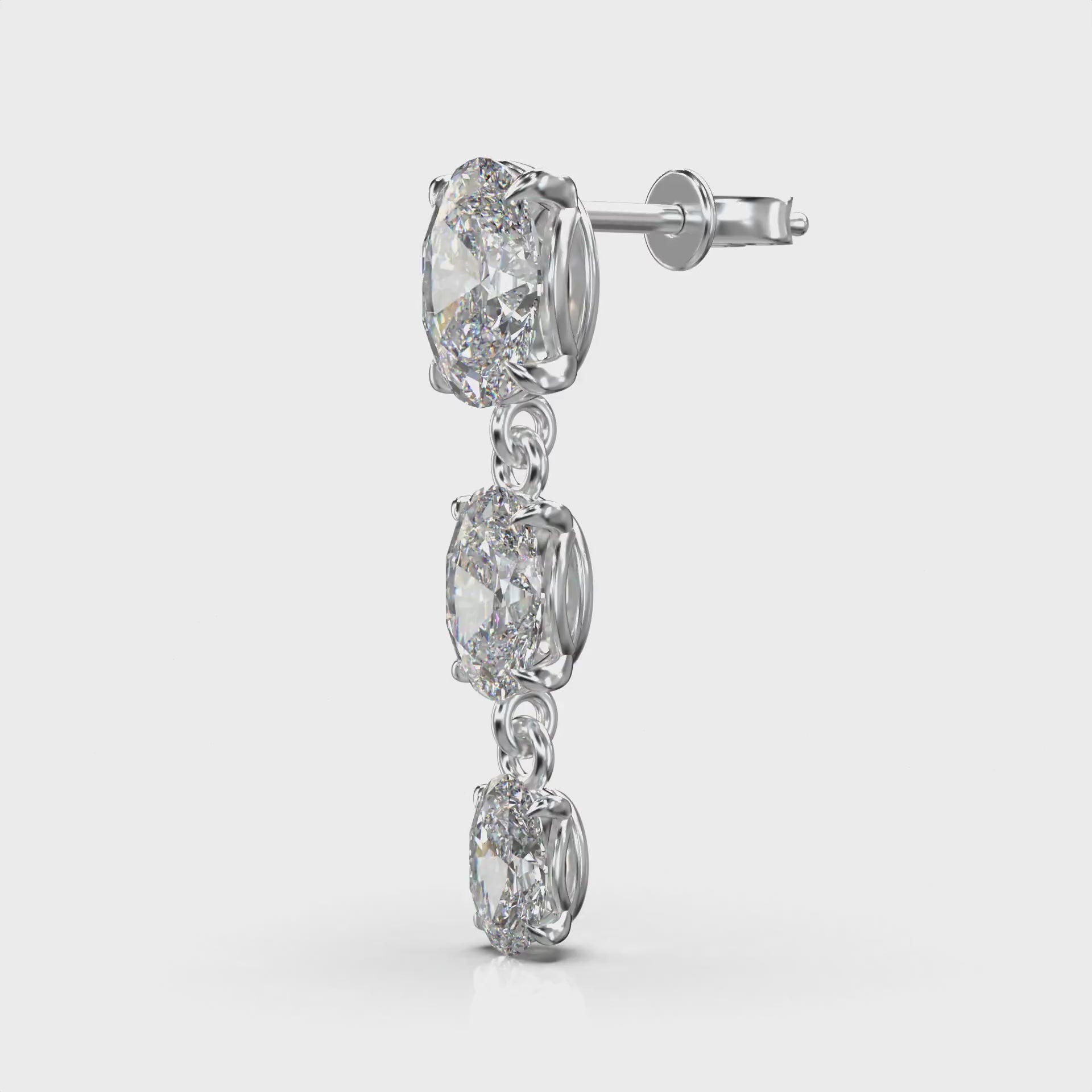 Aria Elongated Oval Three-Stone Graduated Drop Earrings — 360 view