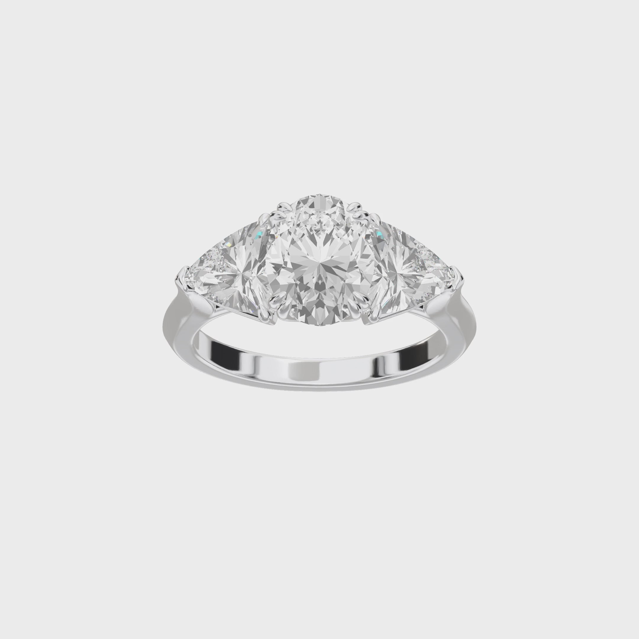 Eve Oval Claw Prong Three-Stone Ring — 360 spin
