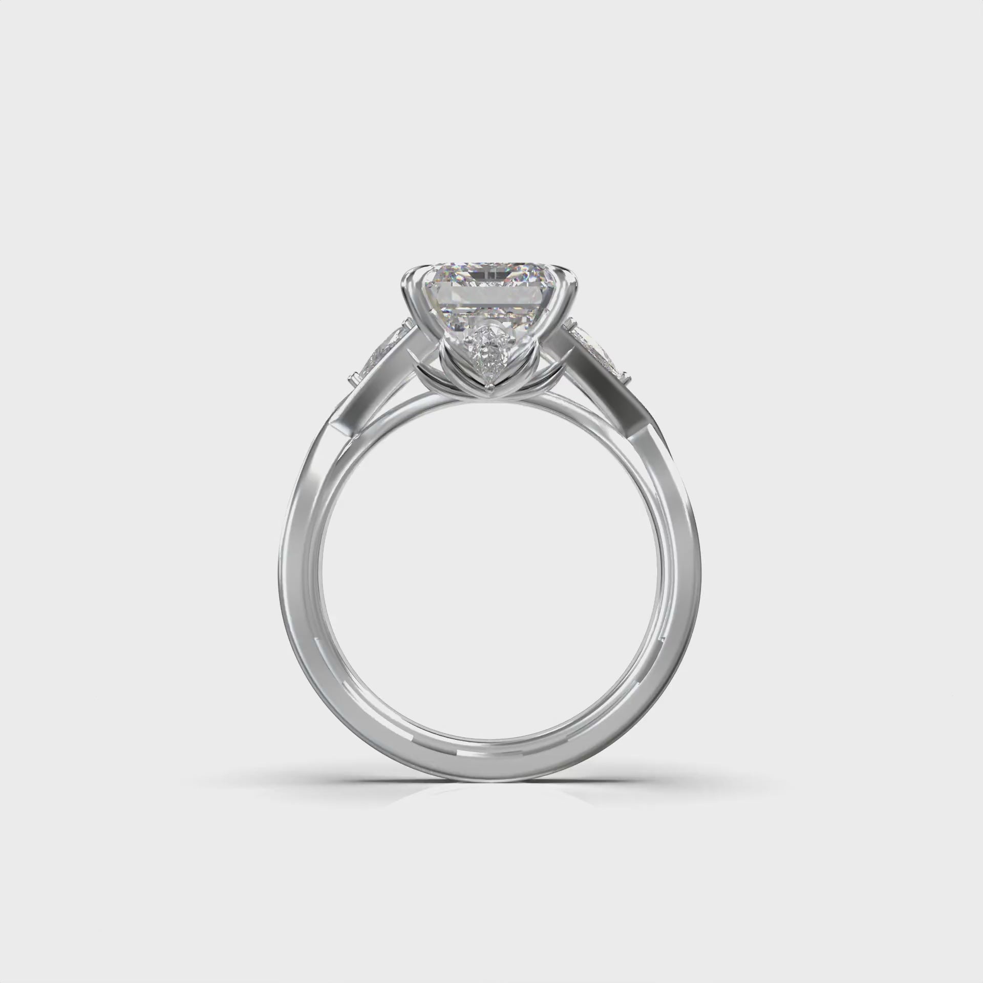 Meiara Eve Emerald Trapezoid Twist Three-Stone Ring in 925 sterling silver