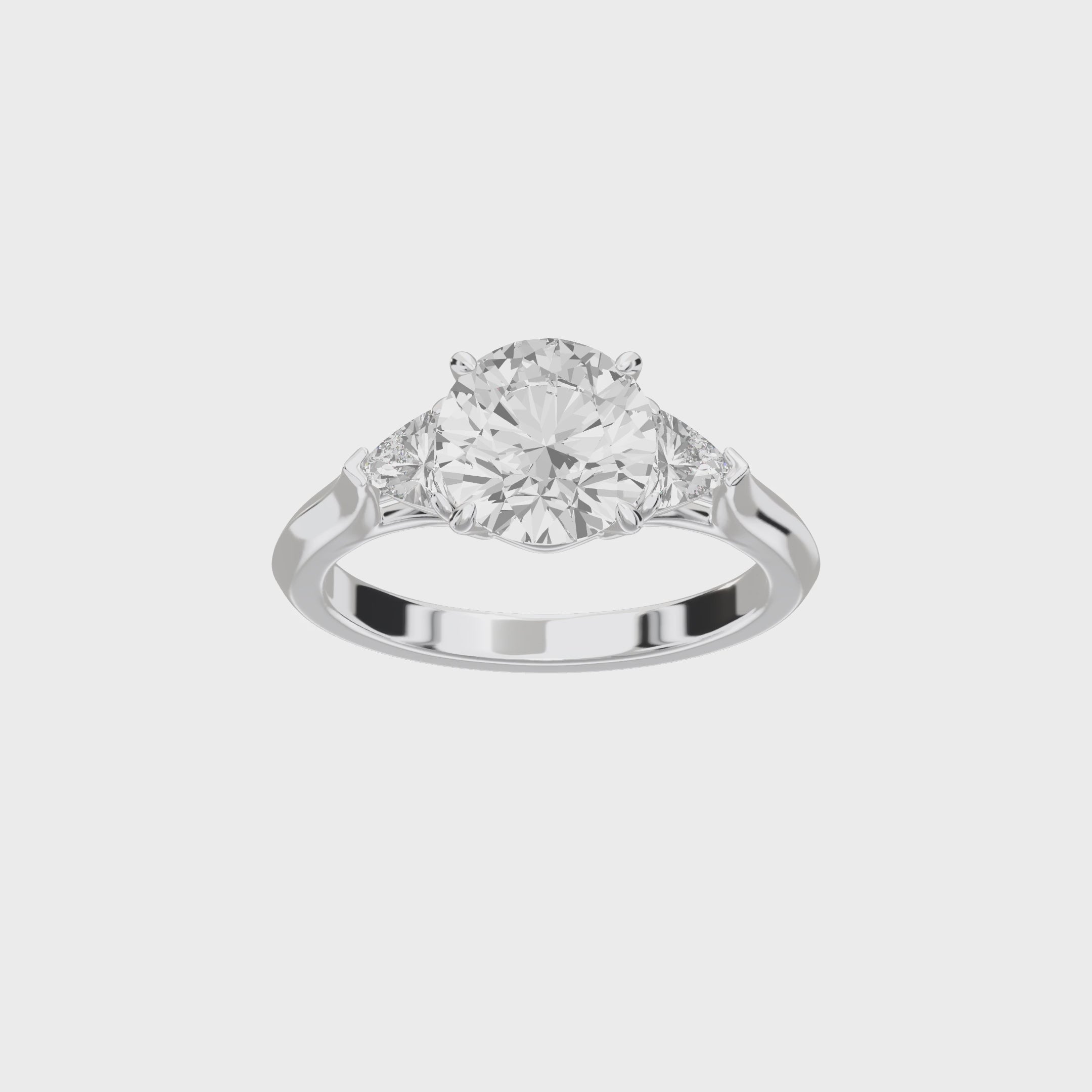 Eve Round Brilliant Claw Prong Three-Stone Ring — 360 view