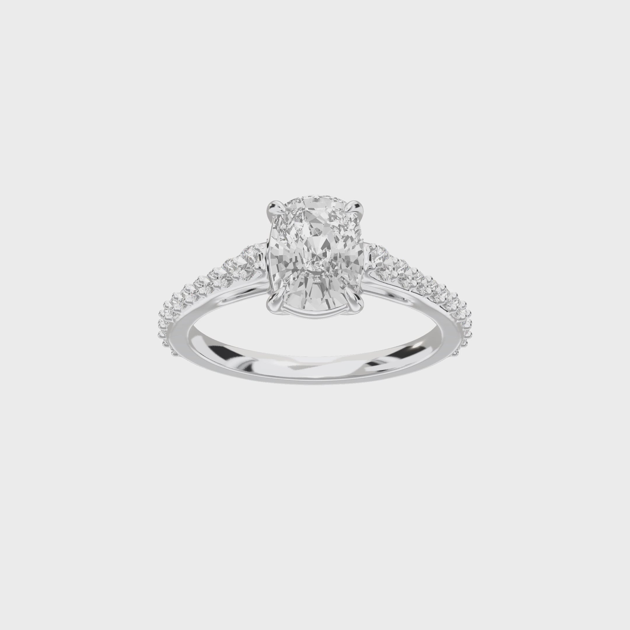 Eve Elongated Cushion Graduated Side-Stone Engagement Ring — 360 spin