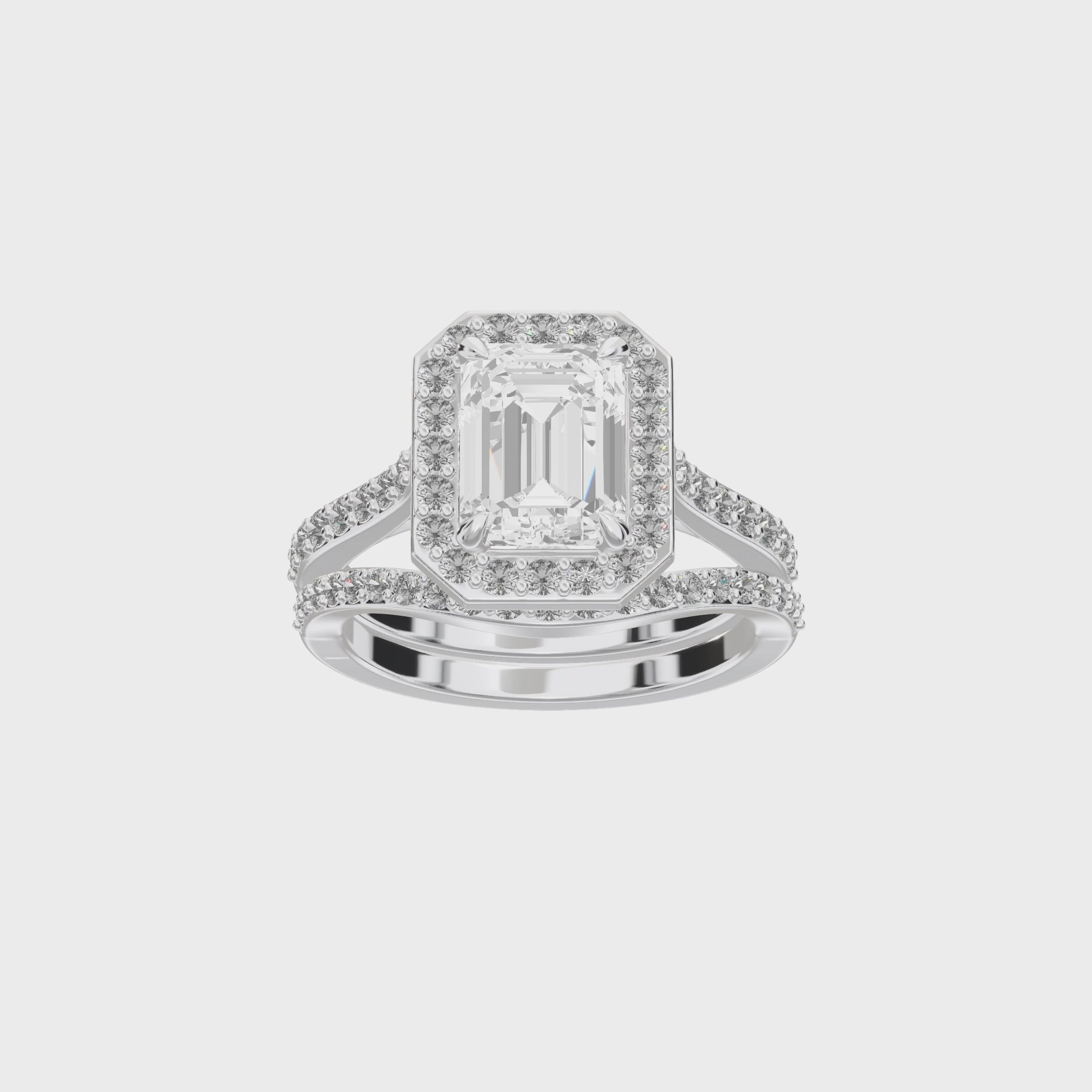 Iris Emerald Accented Halo Bridal Set — 360 spin