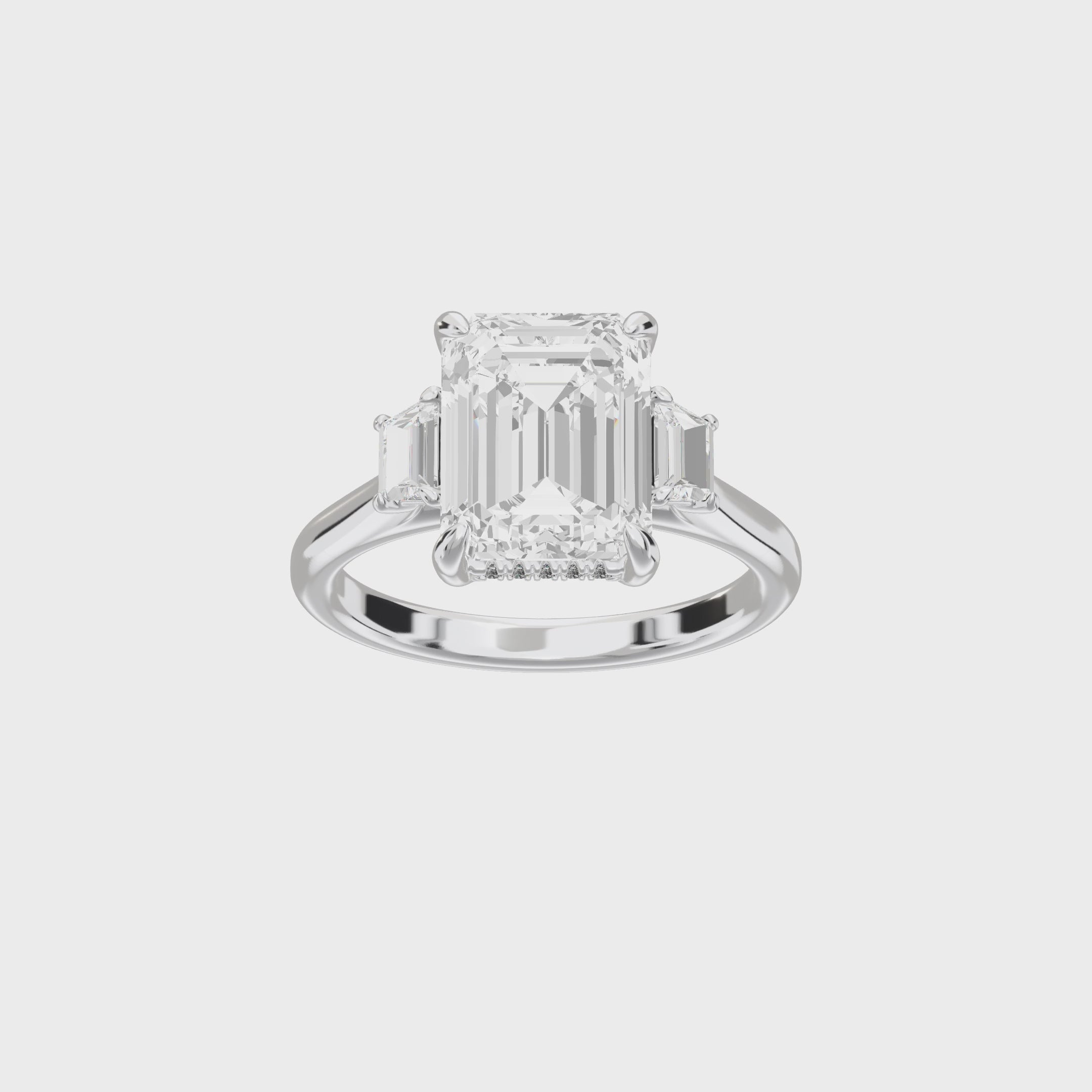 Eve Emerald Trapezoid Three-Stone Ring — 360 view