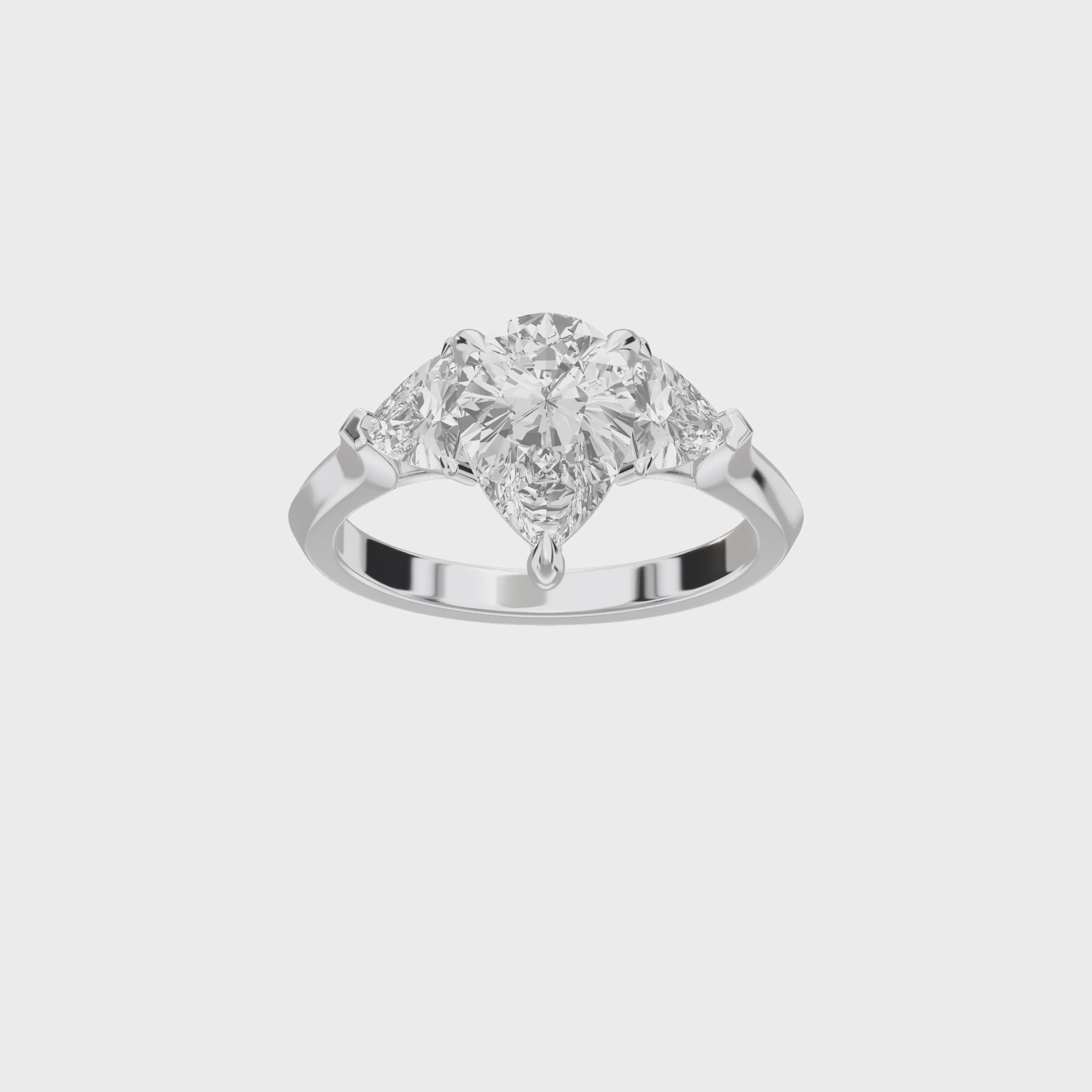 Eve Pear Claw Prong Three-Stone Ring — 360 spin