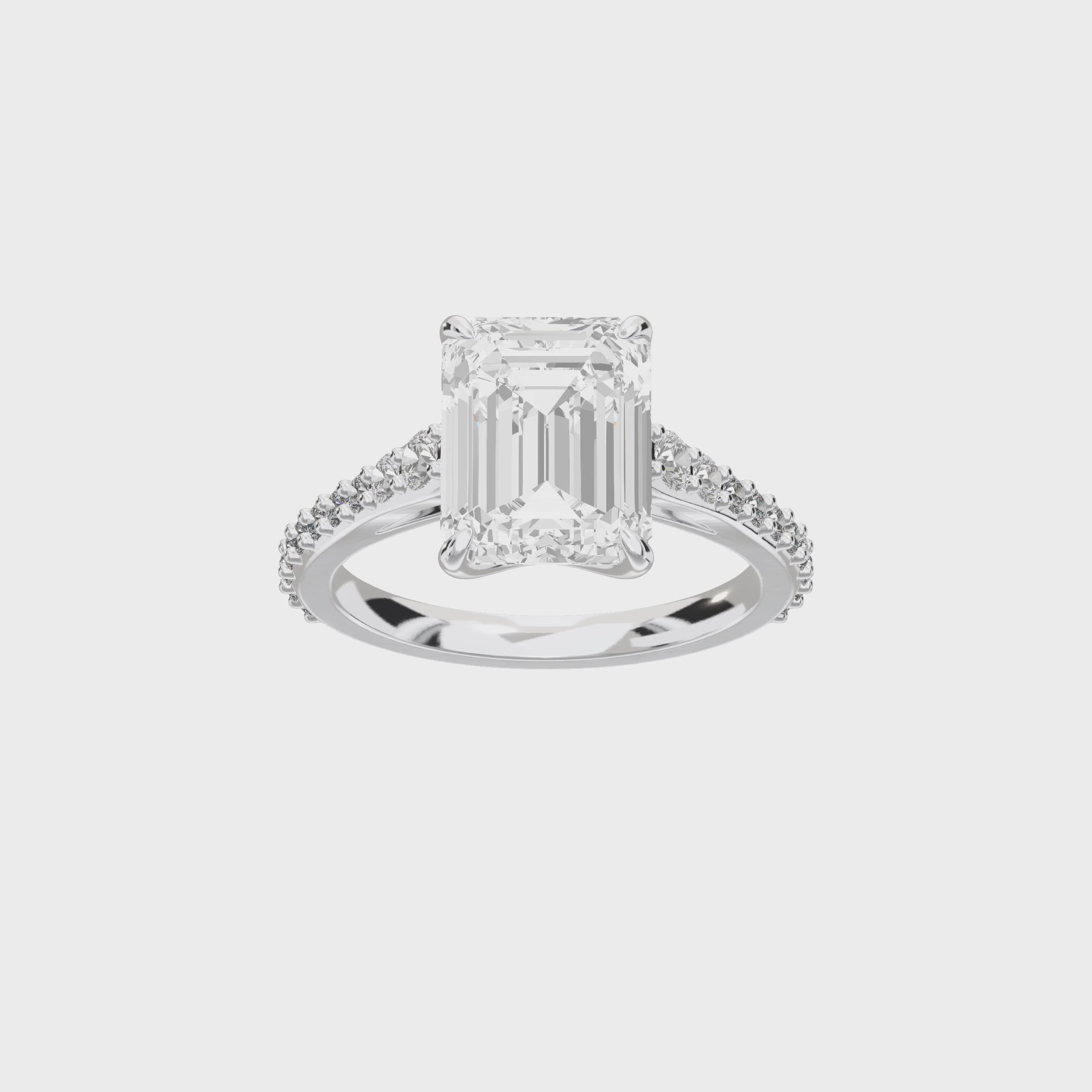 Eve Emerald Graduated Side-Stone Engagement Ring — 360 view